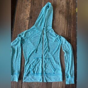 Mossimo light turquoise zip up seater size XS. Has some stretch.